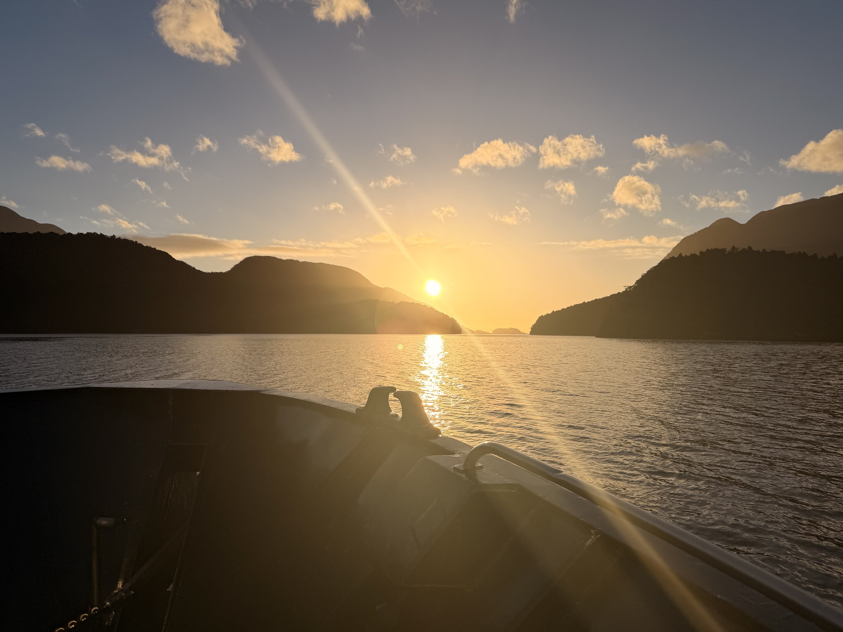 Fiordland Expeditions vessel at sunset on Doubtful Sound